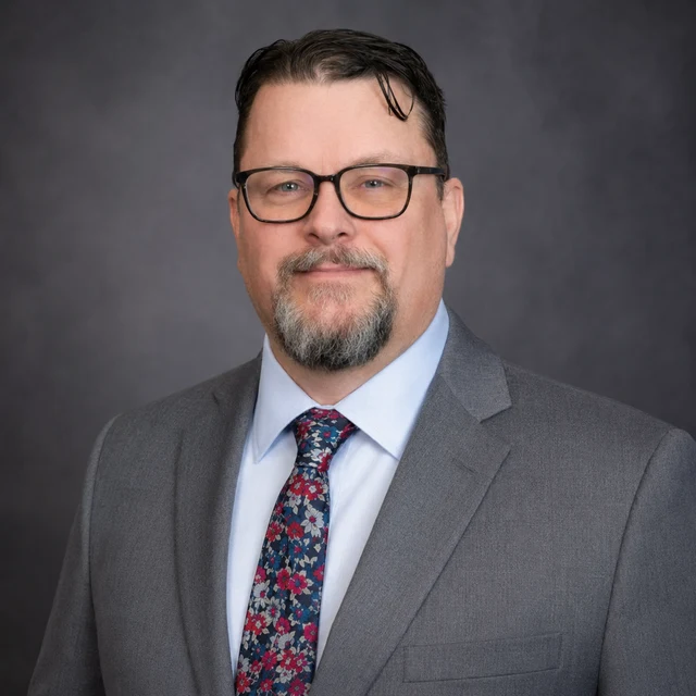 Dr. Justin Ubert